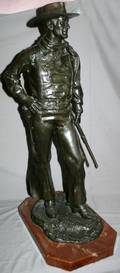 070011 BRONZE SCULPTURE 29 H X 10 W JOHN WAYNE