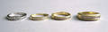 Four 14K gold and diamond wedding bands