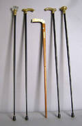 Five canes to include 3 with brass hand holds