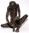 JAPANESE BRONZE FIGURE OF MAN SMOKING A PIPE