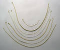 Seven 14K gold necklaces and bracelets