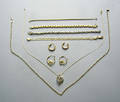 Ten pcs of 10K gold jewelry to include a necklace with amethyst pendant
