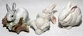 PORCELAIN FIGURES OF RABBITS THREE H 3 L 5