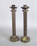 Pair of tin candleholders