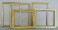 Fourteen carved giltwood frames in various sizes ranging from 12 12 x 9 to 27 12 x 21