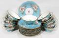 021325 PORCELAIN PEDESTAL TEA CUPS  SAUCERS 9