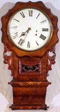 010286 BURL WALNUT WALL CLOCK H 31 L 16