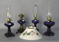 Four cobalt glass table lamps