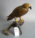 Contemporary carved figure of a falcon