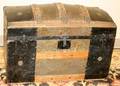030426 ANTIQUE OAKBANDED HUMPBACK STEAMER TRUNK