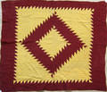 Pieced sawtooth pattern quilt