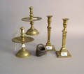 Two pair of brass candlesticks