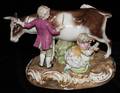 051098 GERMAN PORCELAIN GROUP CHILDREN MILKING A COW