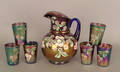 Enamel decorated carnival glass lemonade set Provenance The Estate of Anne Brossman Sweigart