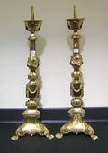 Pair of brass torcheres