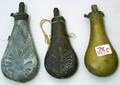 Three powder flasks