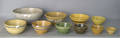 Ten yellowware and pottery mixing bowls to include a blue sponge bowl
