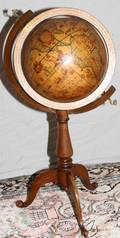 062317 GLOBE OF THE WORLD ON A WALNUT STAND MODERN