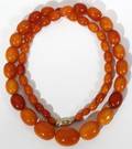 061346 AMBER POLISHED NECKLACE WITH GRADUATED BEADS
