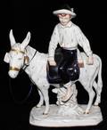 071346 ROYAL DUX FIGURE OF A BOY ON A DONKEY H 15