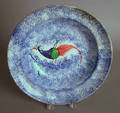 Blue spatter soup bowl with peafowl