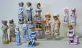 Thirteen bisque figures