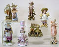 Eight porcelain and bisque figures