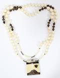 061577 IVORY NECKLACE WITH SILVER SPACERS L 36