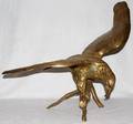 051577 BRASS SCULPTURE OF A PERCHED EAGLE H 24 W 34