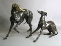 Two bronze whippet figures