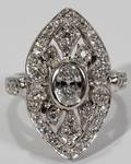 061046 14KT GOLD OVAL  SIDE DIAMOND RING