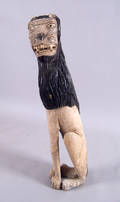 Carved and painted figure of a lion 20th c