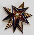 012131 TIFFANY  CO 18 KT GOLD ENAMEL DIAMOND BROOCH
