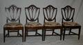 010110 CARVED MAHOGANY SHIELD BACK CHAIRS SET OF FOUR