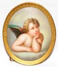 091197 GERMAN PAINTING ON PORCELAIN OF A CHERUB