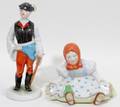 012247 HEREND PORCELAIN BOY WITH AX  GIRL WITH FROG