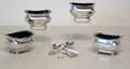 Four silver open salts with blue glass liners and 4 spoons by John  Edward Edwards