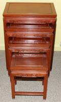 012327 CHINESE TEAKWOOD NEST OF TABLES 20TH C FOUR