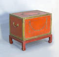 Red painted box with brass tack decoration