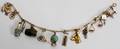 012392 14 KT YELLOW GOLD CHARM BRACELET WCHARMS
