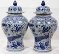 102458 DELFT BLUE  WHITE FAIENCE COVERED URNS PAIR