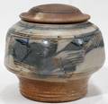 100485 JOHN GLICK PLUM TREE ART POTTERY JAR H 6