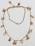 101058 14KT YELLOW GOLD CHAIN WITH 14 CHARMS L 29