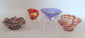 Four art glass ashtraysbowls
