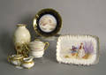 Group of Limoges to include 3 plates with wild fowl decoration