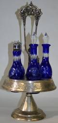 051210 VICTORIAN SILVERPLATE CRUET STAND WBOTTLES