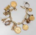 021089 14KT GOLD BRACELET L 6 WCHARMS  GOLD COINS