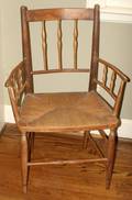 021085 ANTIQUE PEAR WOOD ARMCHAIR ROPE SEAT