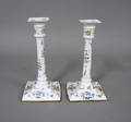 Pair of enameled candlesticks