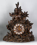 Black Forest carved shelf clock late 19th c
